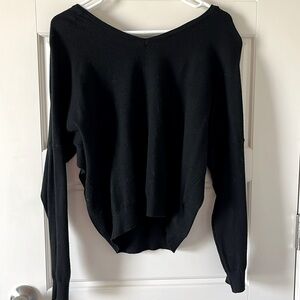 Black off-shoulder, open back sweater. XSP. Viscose, polyester and nylon